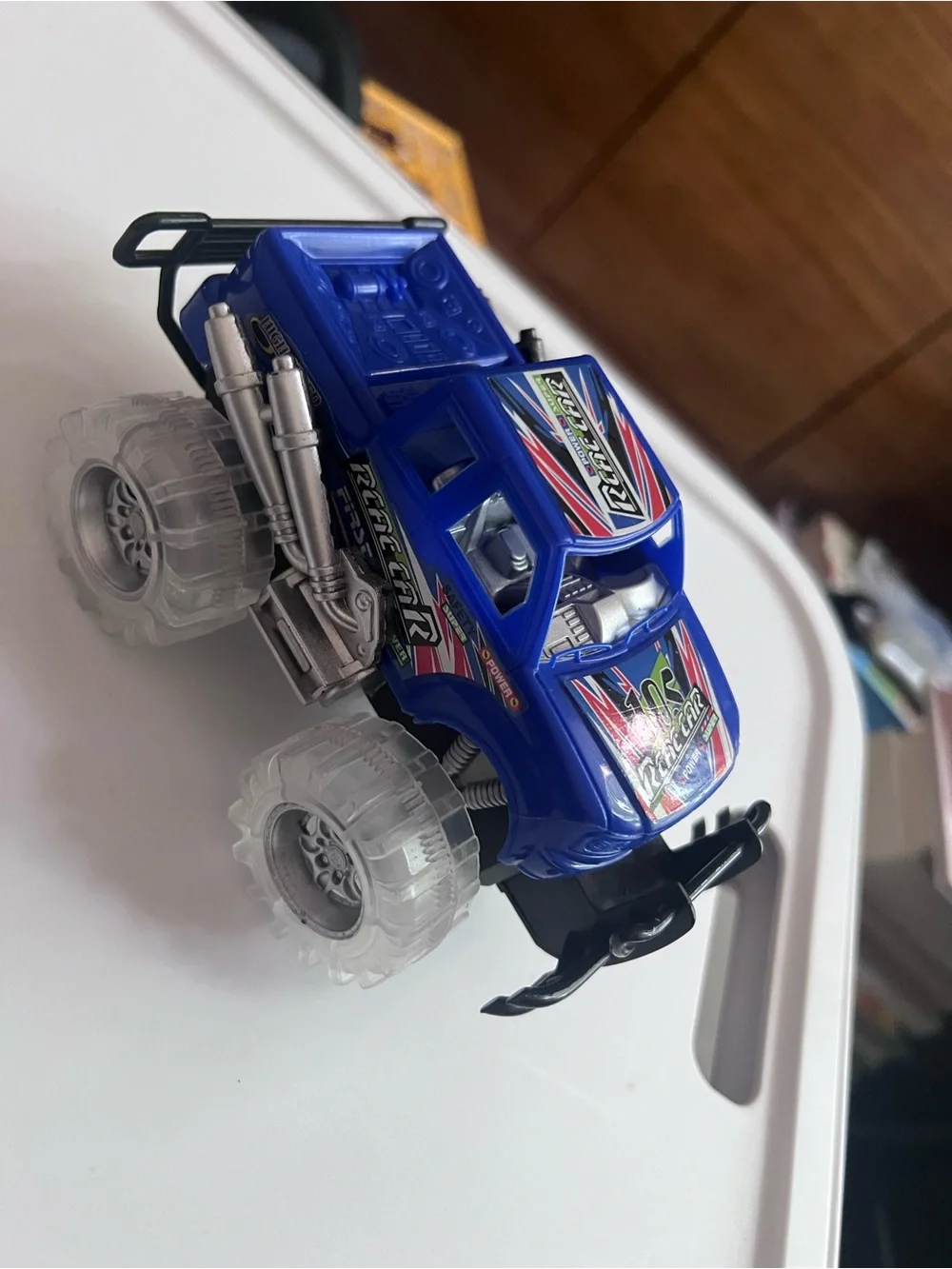 Light-Up Blue Monster Truck Toy – Friction Powered Push & Go Car with LED Tires
